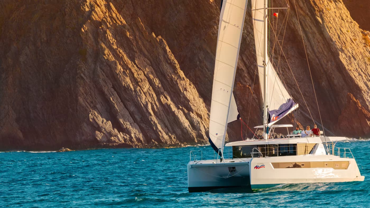 Sailing past cliffs in the British Virgin Islands